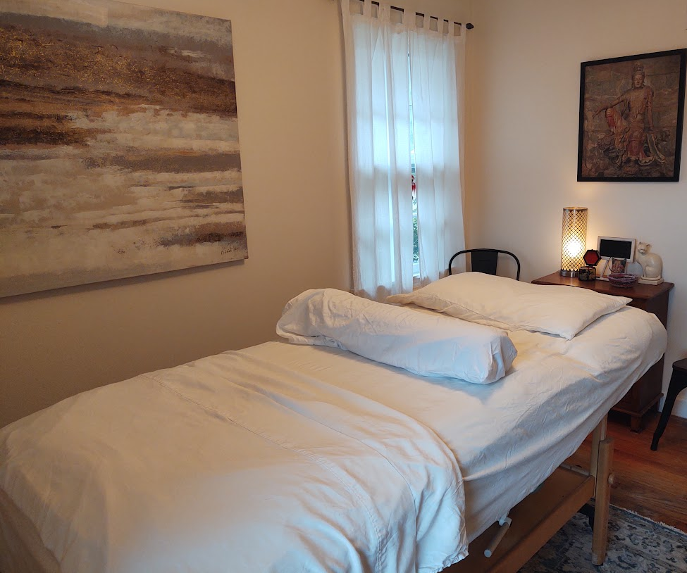 Treatment room at Rena Howell Acupuncture, with a treatment table ready for a session